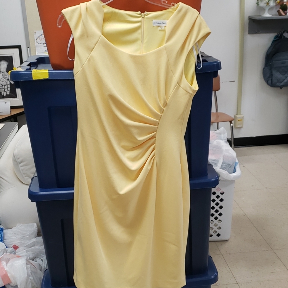 Yellow Calvin Klein mid length dress looks new